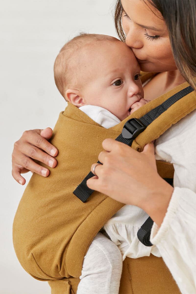 Tula Hemp Free-to-Grow Baby Carrier Olivine in a color of antiqued beige/green