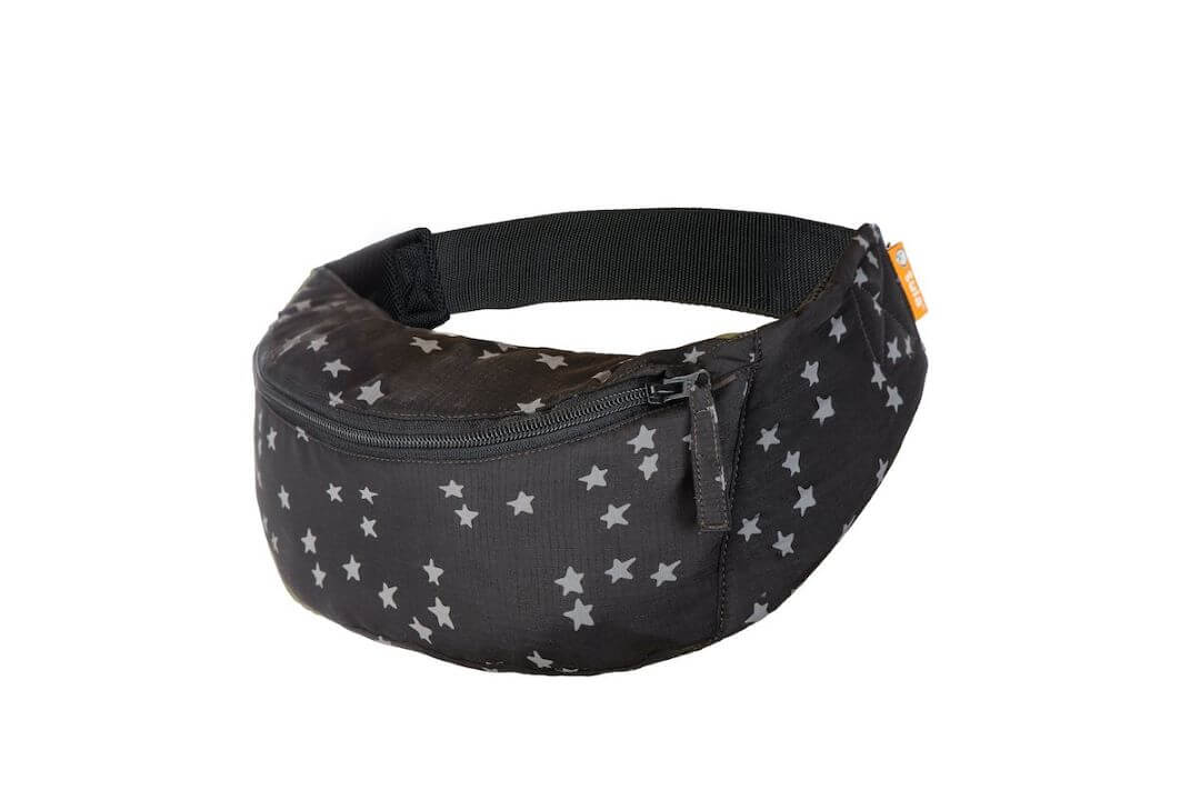 Foldable travel baby carrier black with grey stars folded into attached hip pouch