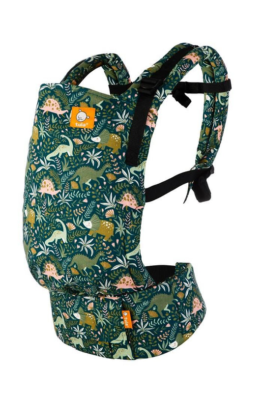 Tula Free-to-Grow Carrier Land Before Tula with a dinosaur print in emerald green and apricot.