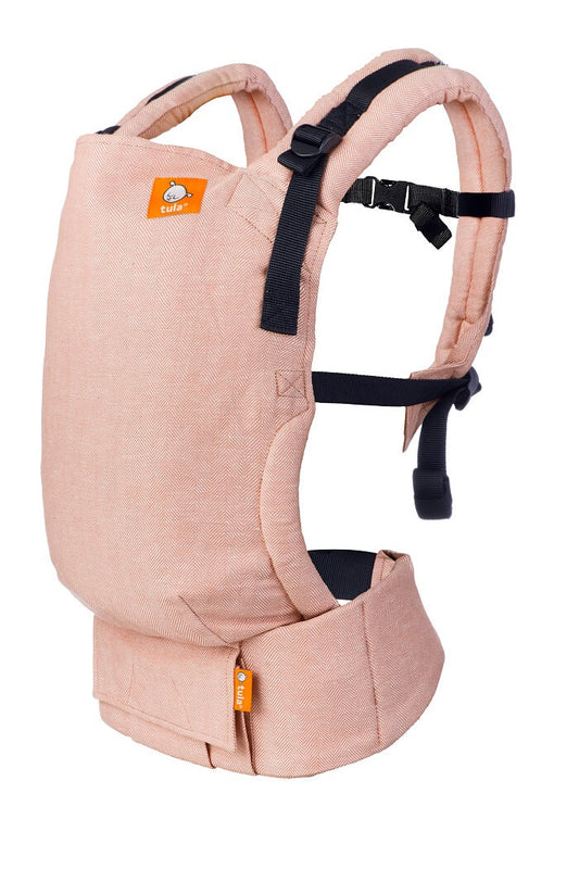 Ergonomic Free-to-Grow Baby Carrier Tula Linen Sunset in neutral colors creating a color that envokes serenity and warmth.