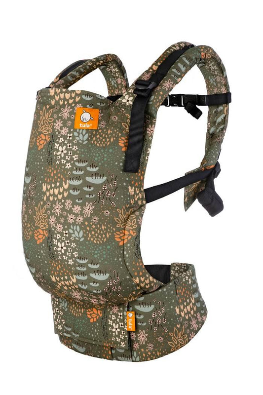 Tula Free-to-Grow Baby Carrier Meadow with meadow flowers on warm green background