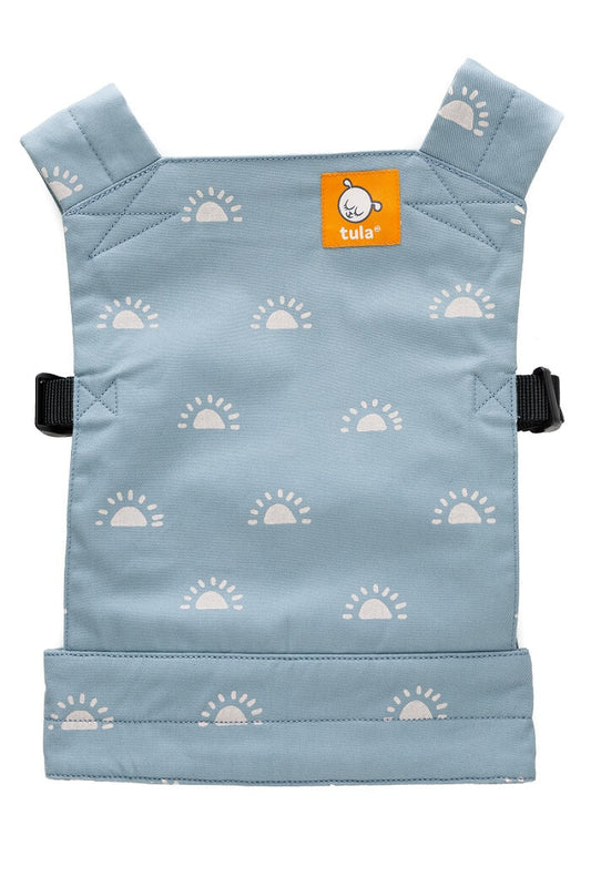 A Toy Carrier for children, coloured in a light blue with illustrations of a sunrise.