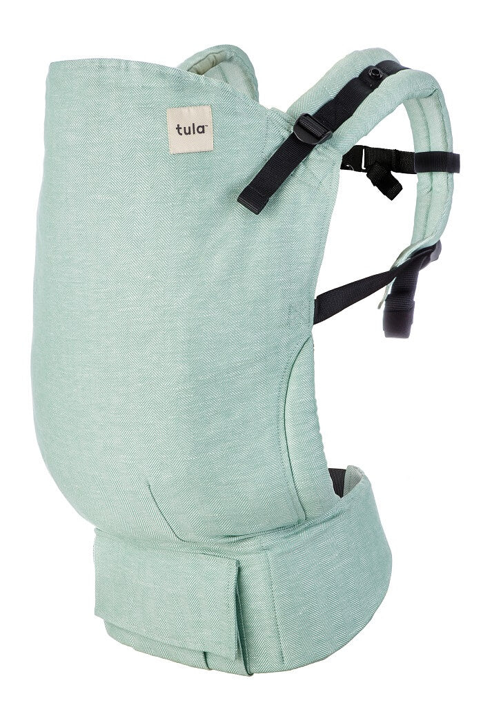 Baby Tula Toddler Linen Eucalyptus carrier is a soft green with gray undertones. 